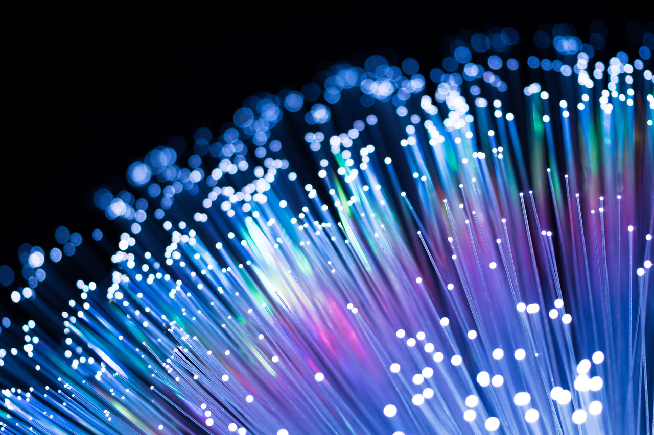 Illuminated Blue Fiber Optics with Spectrum Close-up View.